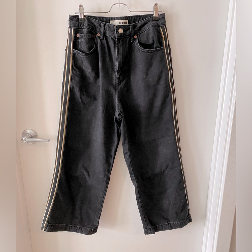 Topshop Moto black denim wide legged jeans.
